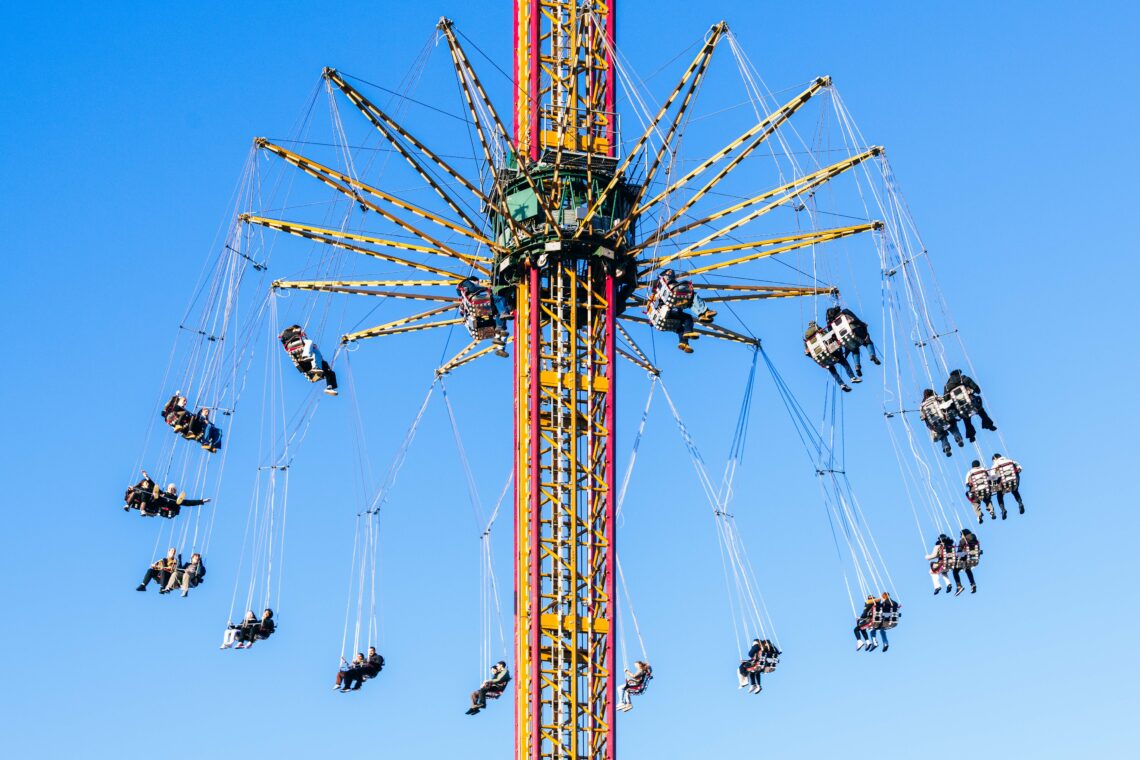 Aeronaut Starflyer ride spinning in the sky during a bright winter's day at Winter Wonderland